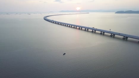 Aerial-view-fishing-boat-beside-architecture-Penang-Second-Bridge